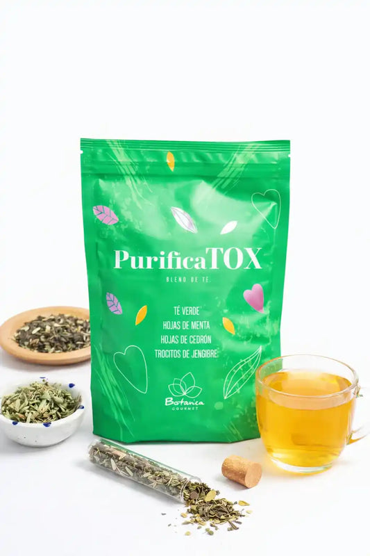 Infusión Purifica TOX de Gourmet Botanica en bolsa de té verde con menta, cedrón y jengibre para detox y bienestar.